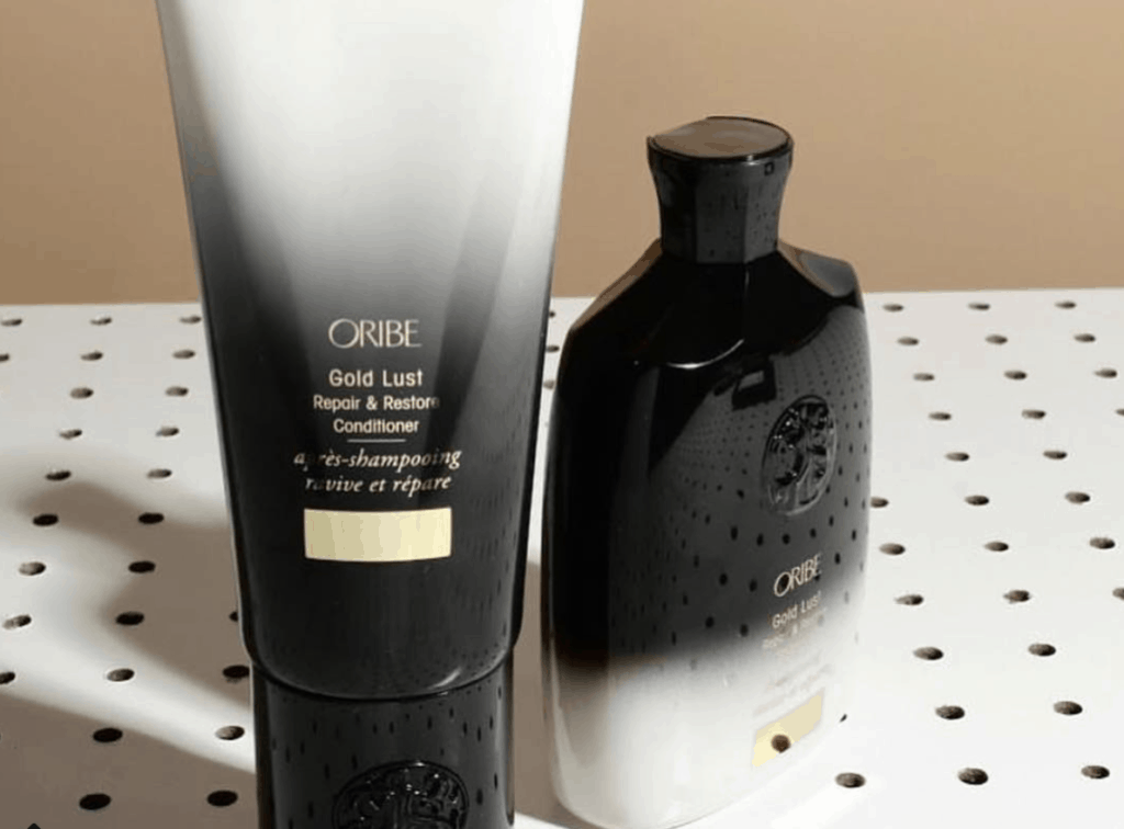 Oribe Gold Lust Shampoo and Conditioner backdrop