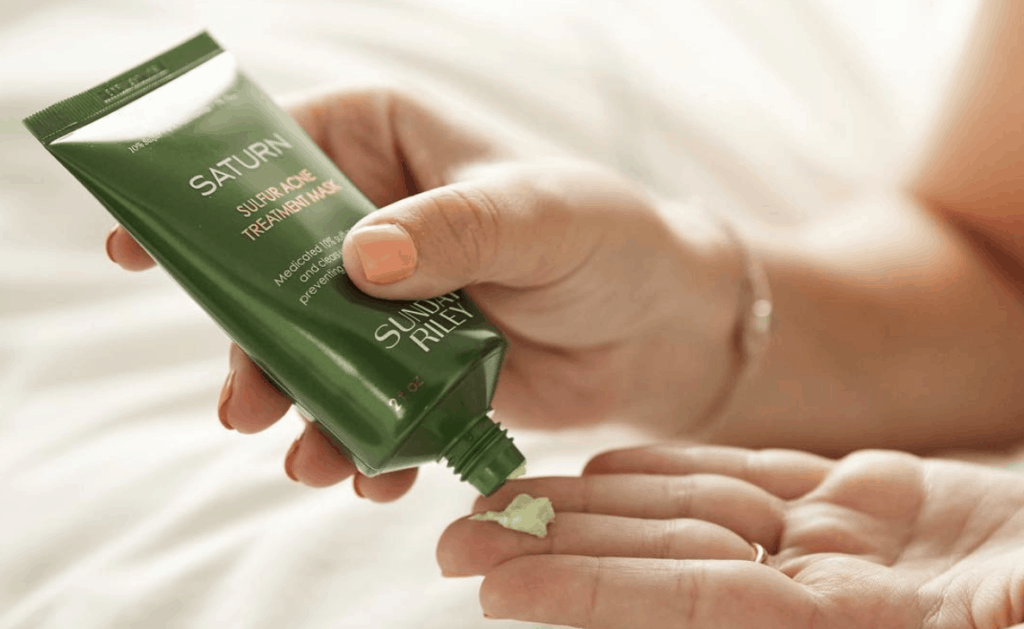 Sunday Riley's Sulfur Acne Treatment Mask used in hands demo